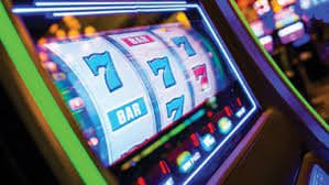 Live dealer blackjack table with player cards and chip wagering